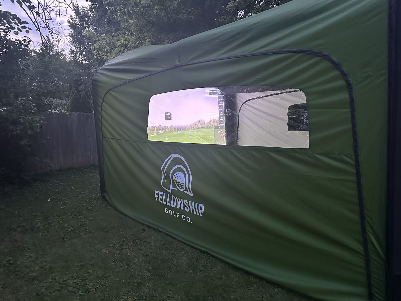 The Fellowship Golf tent on-site at an outdoor event